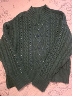 Dark green knitted sweater with dark green beads