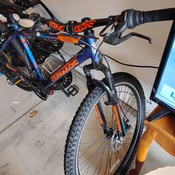 Mongoose Exhibit Mountain Bike, 29 Inch Wheels, 21 Speeds, Blue