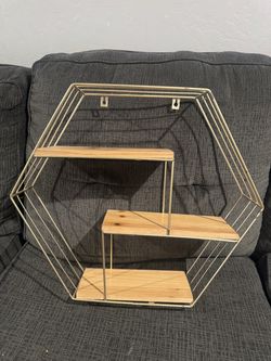 Floating gold shelves