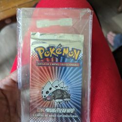 Graded Pokemon Slabs & Unopened Pack Of Rubi And Zafieo