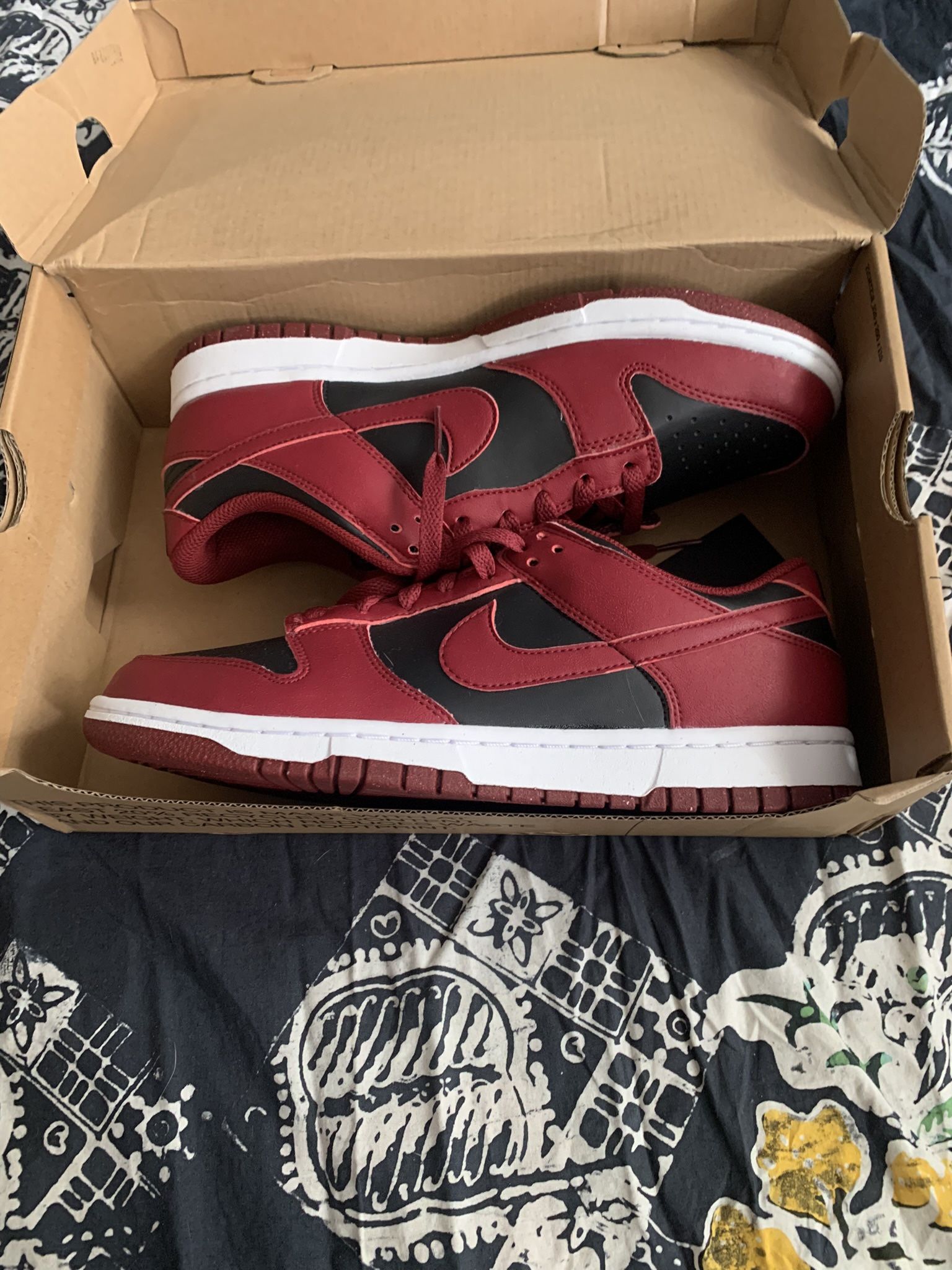 Red and Black Nike shoes