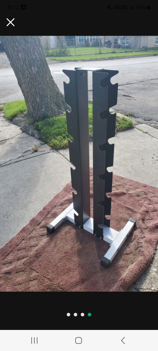 NORTHERN LIGHTS  VERTICAL DUMBBELL RACK  HOLDS 6 SETS 
7111.S WESTERN WALGREENS 
$70.   CASH ONLY AS IS