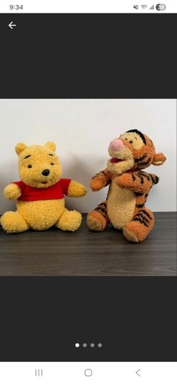 Winnie the Pooh and Tigger plush toys
