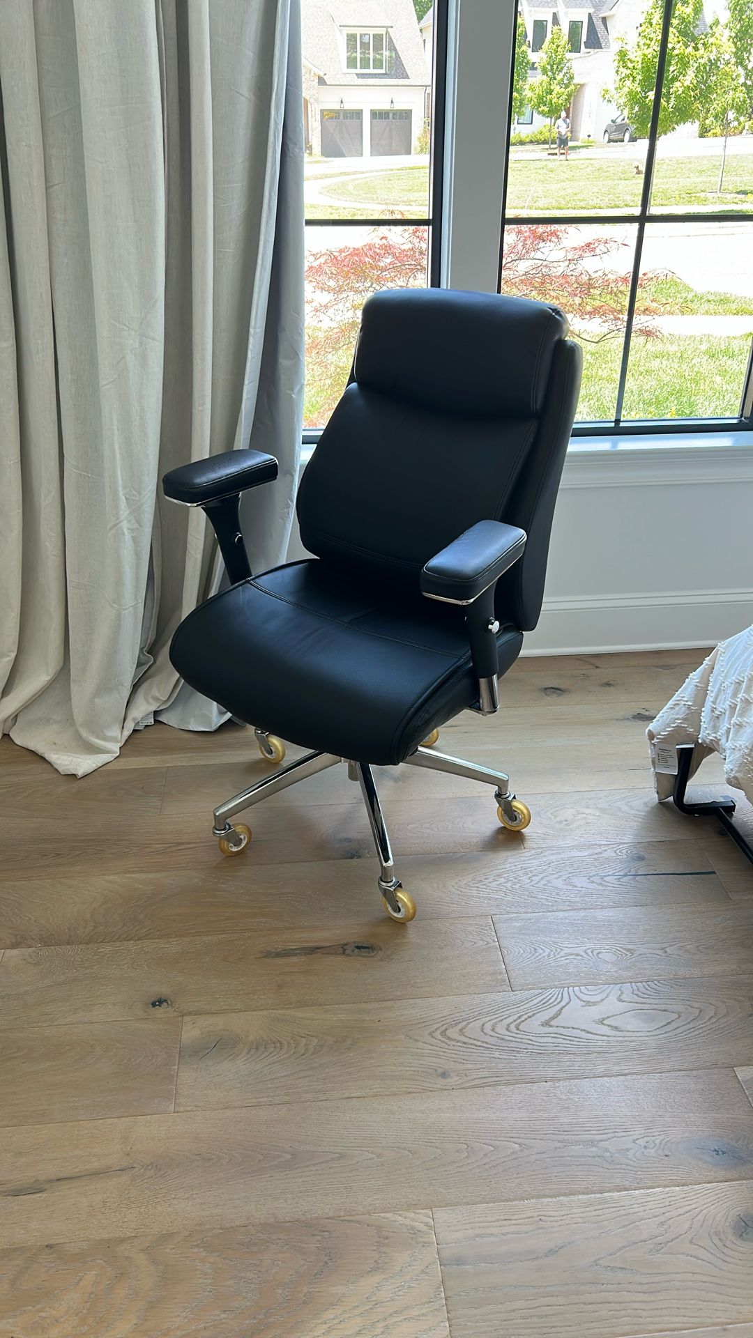 Black Adjustable Office Chair On Casters