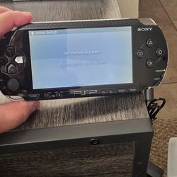 Sony PSP-1001 Handheld Console Black With 6 Games, Carrying Case, Charger