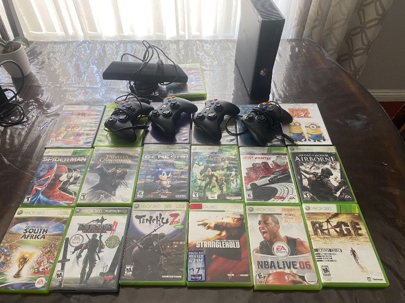 Xbox 360, 4 controllers, & games