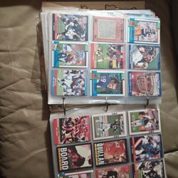 Two Albums Full Of Football Cards