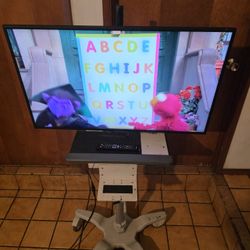 Samsung 40Inch. Smart  TV With Rolling  Stand Up Adjustable On Wheels Mobile Cart  Desk 
