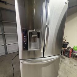 Good working LG stainless refrigerator/ freezer