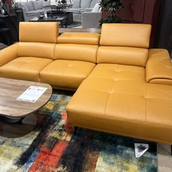 New Right Or Left Facing Sectional.  Tangerine 🍊 Leather Match W Metal Legs.  111”x68”x29”H.  Free Delivery!