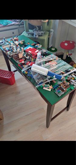 Lego table and box full of legos