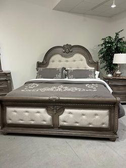 Luxurious Grandeur bedroom set features classic accenting and traditional lines
