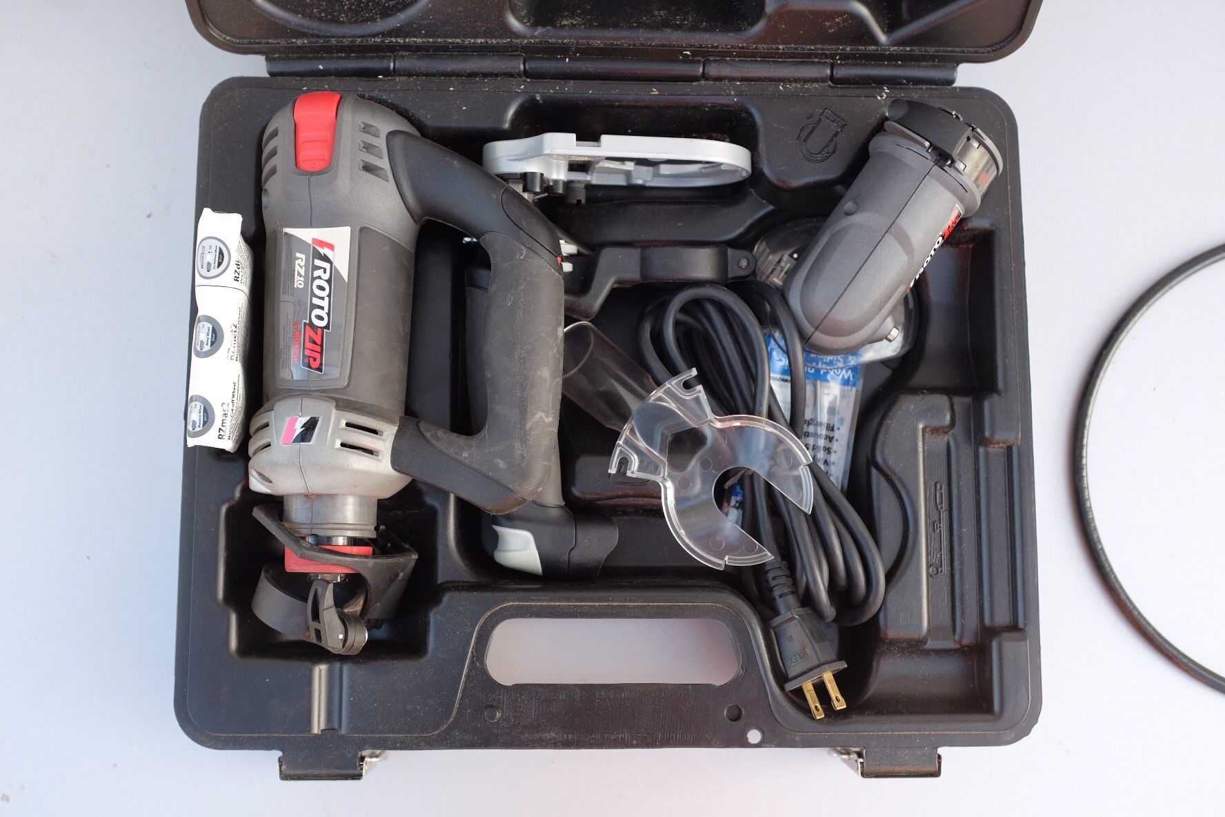 ROTOZIP by BOSCH. RZ102100. With cutter, router, and flex attachments