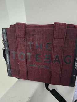 red bag with black straps