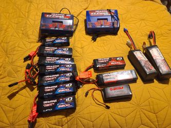 Traxxas batteries ...pickup in forney 2s 5800 $30....2s 7600mah $35...3s 5000mah $40...charger on the right 65cash its new .....1 on left 50.