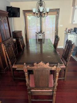 Antique dining room table and chairs. Make me an offer.