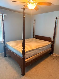 Queen size 4 poster bed (mattress, and boxspring included)