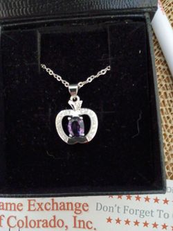 Apple shaped diamond/ silver pendant with oval amethyst stone