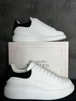Alexander McQueen white with diamond.