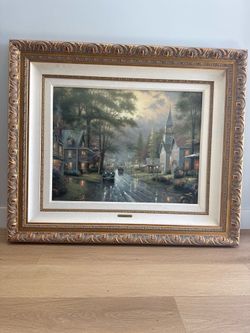 Thomas Kinkade Framed Village Scene – Rainy Church Street – 22.5” x 29”