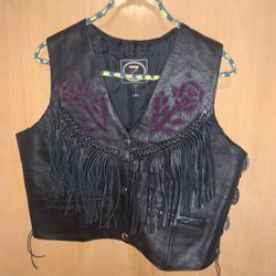 Woman’s Leather Vintage Vest With Fringes Embroidered With Concho Accents 