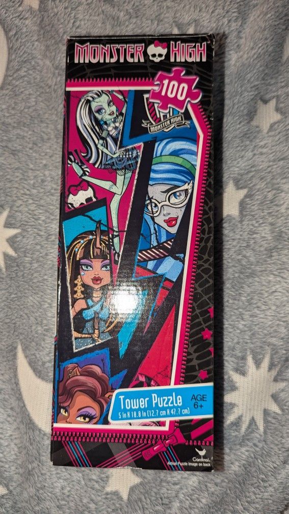 Monster High Tower Puzzle - 100 Pieces        18" x 5" Finished.

