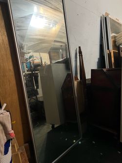 Mirror sliding closets doors
