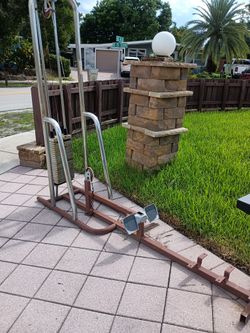 1 Row Machine.   1 Abs/Pull Down Machine 