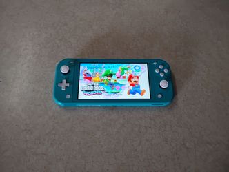 NINTENDO SWITCH LITE MOD LOADED with 7500 GAMES