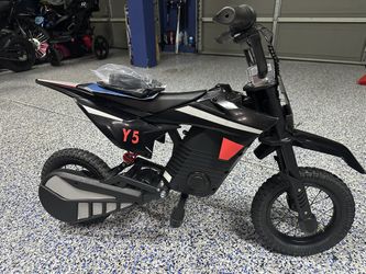Y5- 36v 300 watt motor kids e moto dirt bike,16mph, up to 25 miles, rgb lighting & 10 inch tires.