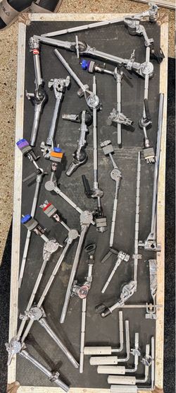 Dw boom arms , dog bones, tom arms ,clamps micro phone mounts and more