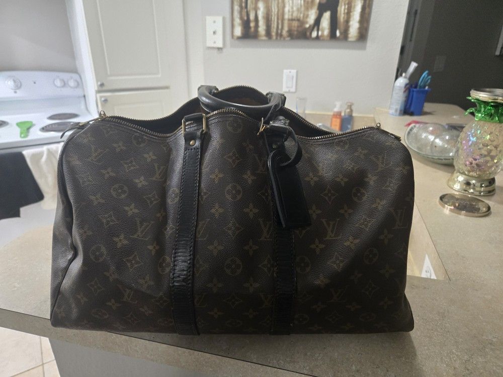 Louis Vuitton Duffle Bag