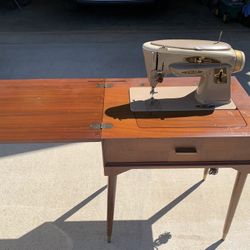 Antique Sewing Machine And Cabinet 
