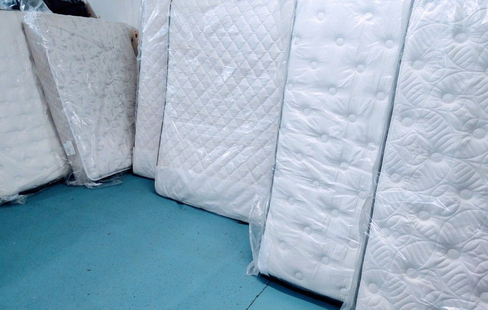 Brand New Mattresses in the Factory Plastic