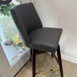 Modern Gray Faux Leather Swivel Counter Height Bar Stools w/ Gold Nailhead Trim (Set of 4)