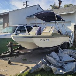 Boat, Motor And Trailer