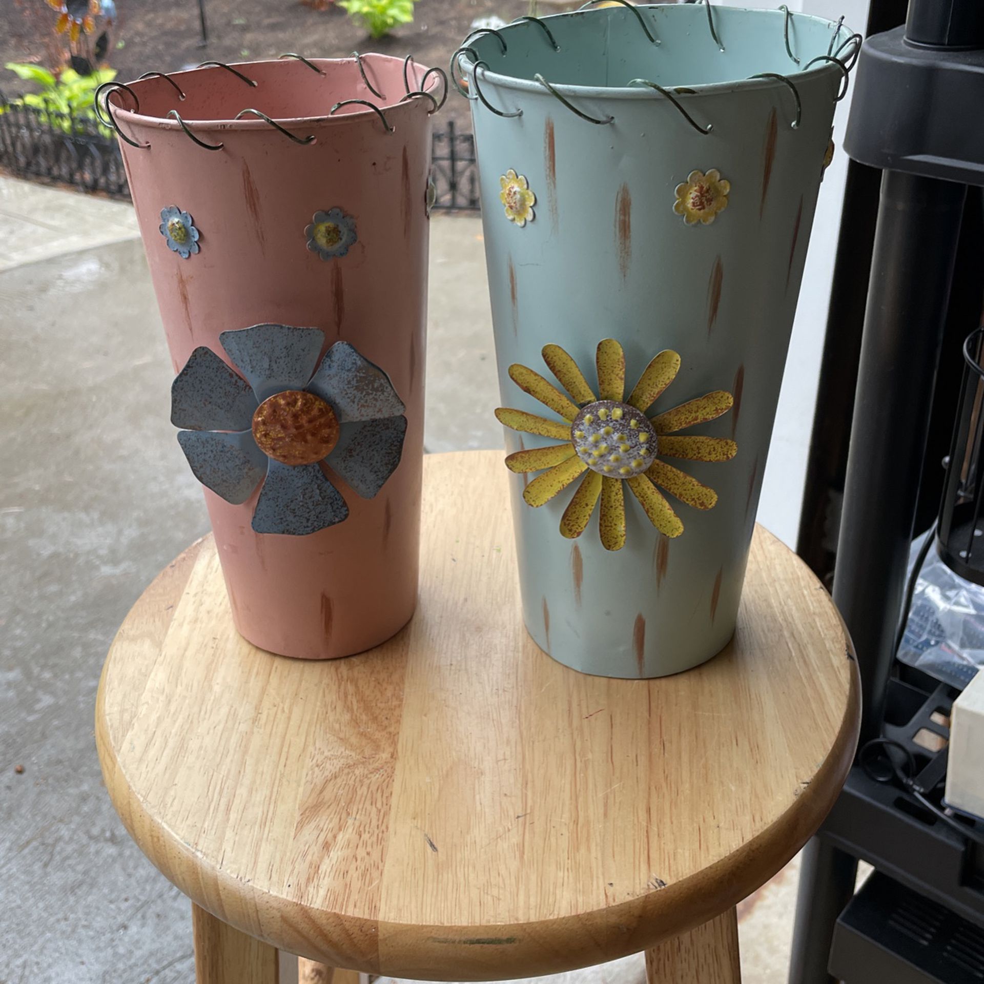 2 Metal Flower Vases Blue Is 9.5” H 5” W Pink Is 9” H 5” W