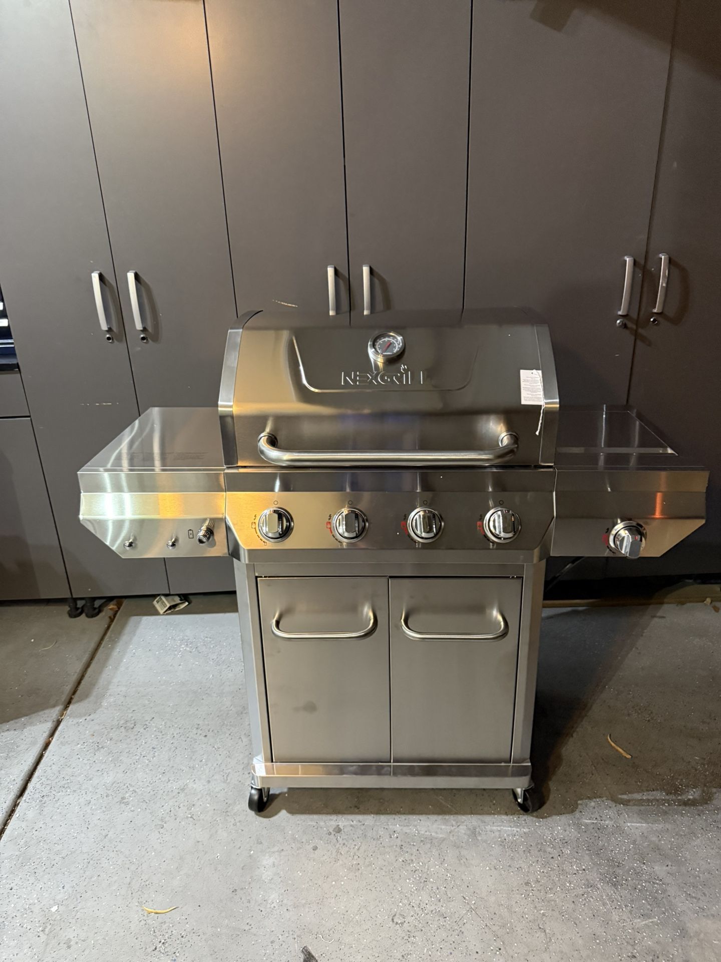 Nexgrill 4 Burner Stainless Steel Propane Gas Grill with Side Burner