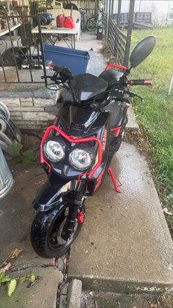 Black and red Gas scooter