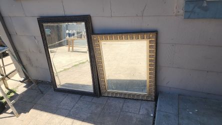 2 large hanging mirrors ones in antique frame