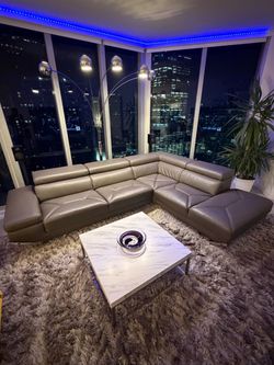 120" Wide Charcoal Gray Faux Leather Right Hand Facing Sofa & Chaise.