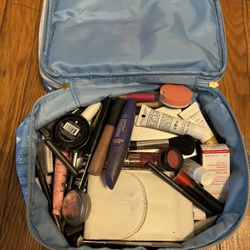 Makeup bag with unused/sample makeup, tools and brushes of all sizes 