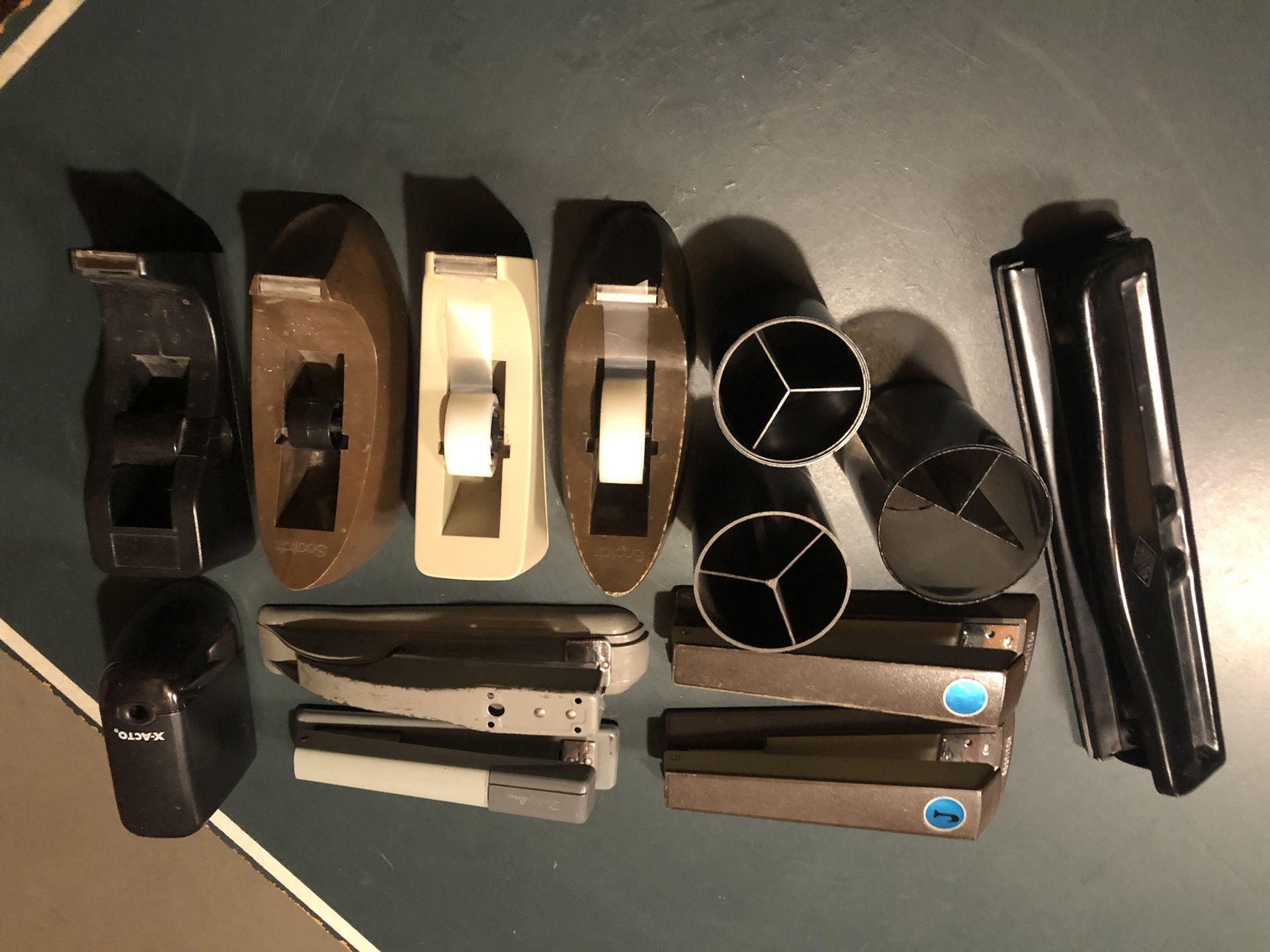 Office Supplies. Pencil Sharpener Battery Operated, 4 Staplers, 3 Pen & Pencil Holders, 4 Tape Dispensers, 3 Hole Punch. $60 For All.