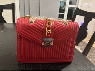 Badgley Mischka. Stunning red purse with gold hardware