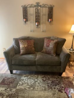 Valour tan love seat rarely used with pillows