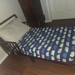 Toddler bed and mattress. 