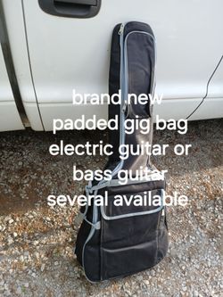Brand new gig bag soft case, heavy padding, backpack style, fits electric guitar or bass