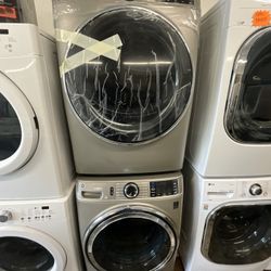 NEW GE Gas Dryer And Used GE Washer Set