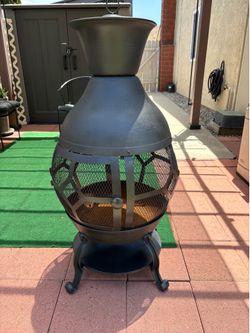 Cast Iron Wood Burning Chiminea Fire Pit in excellent condition only $80!!!!!!