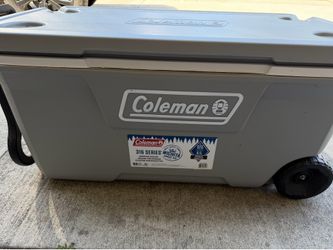 New- Coleman 100qt hard insulated wheeled chest coller